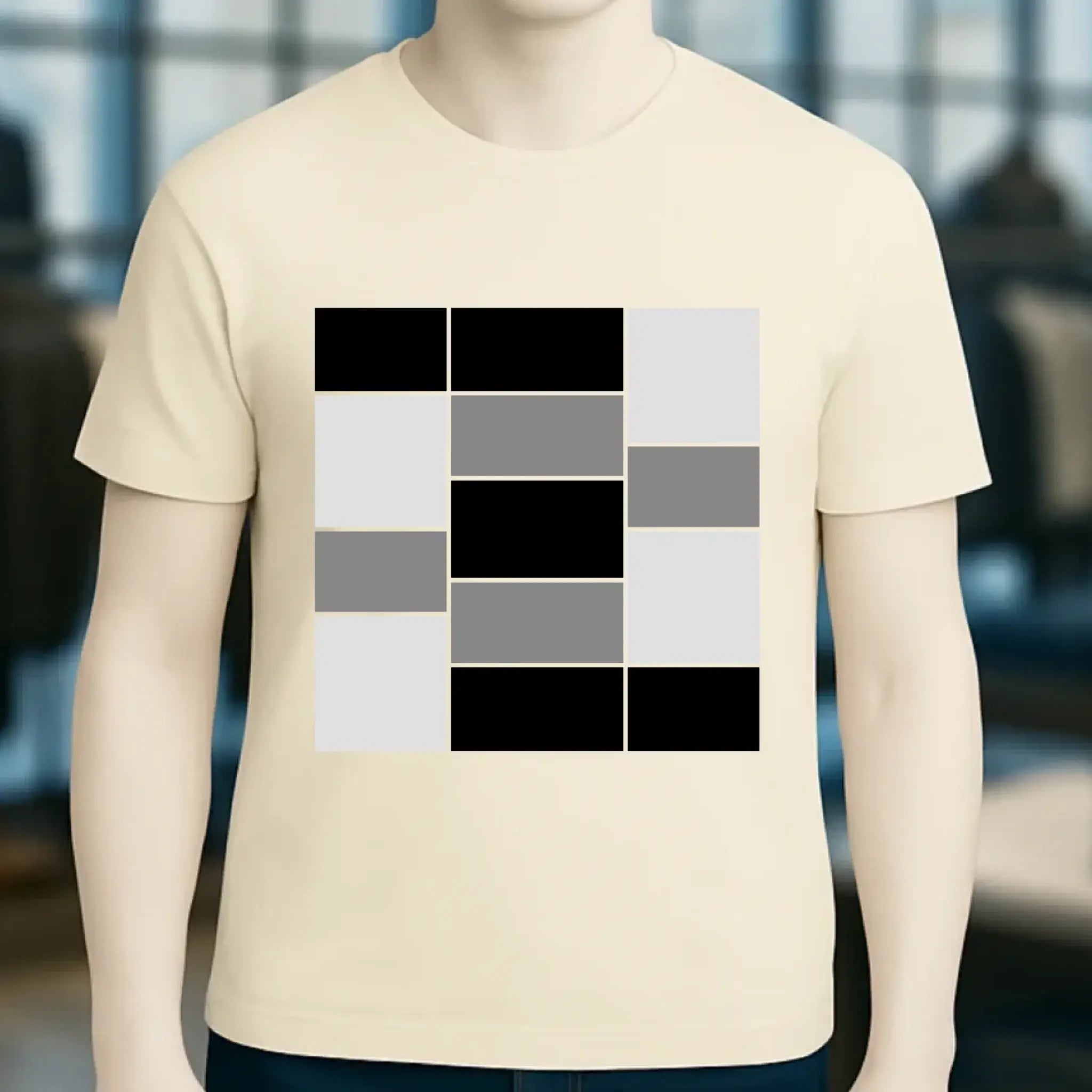 Creamfarbenes unisex bio-baumwoll t-shirt mit fettem geometrischem muster aus schwarzen, grauen und weißen quadraten