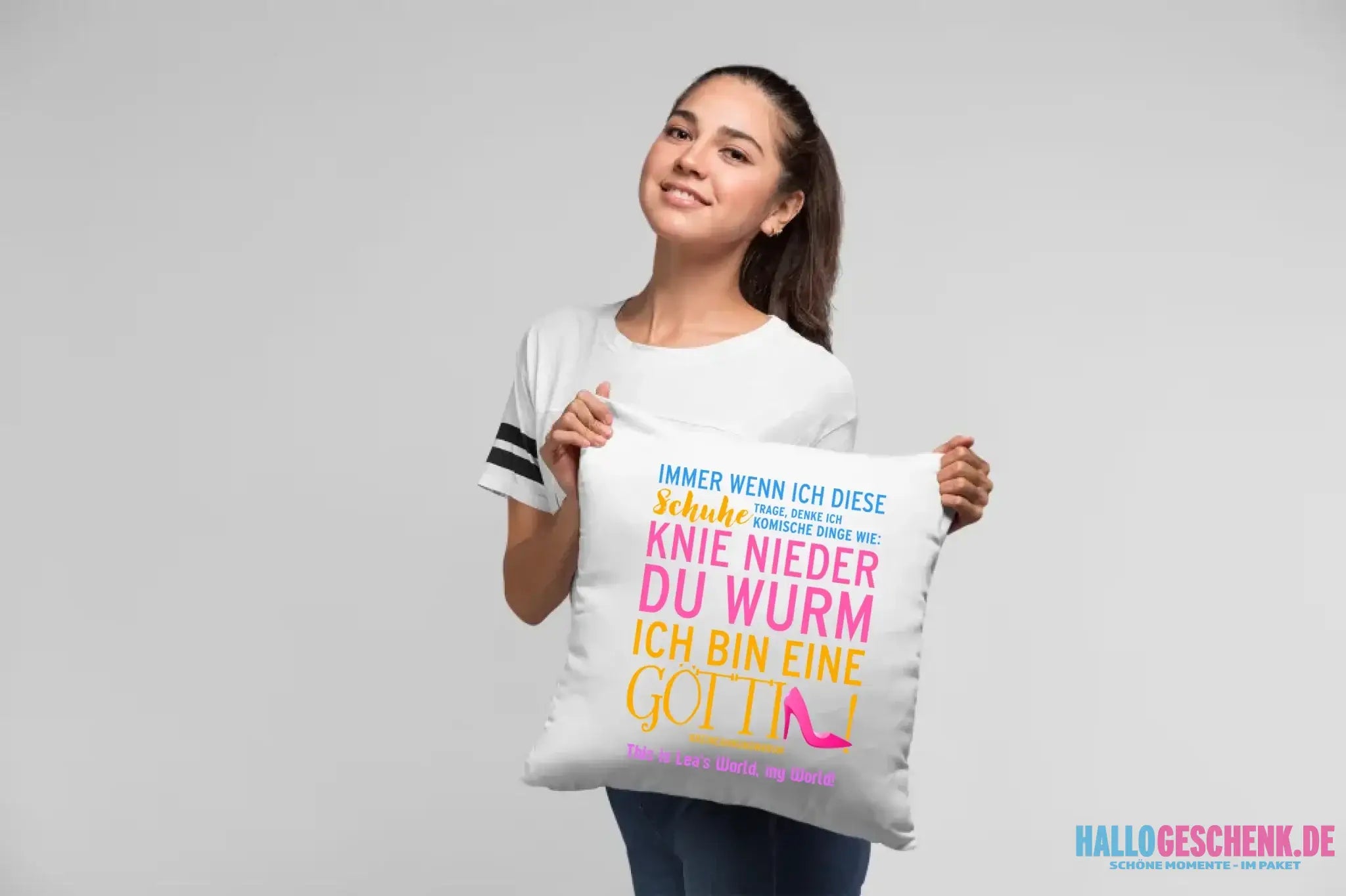 pillow-mockup-of-a-woman-at-a-studio-23674