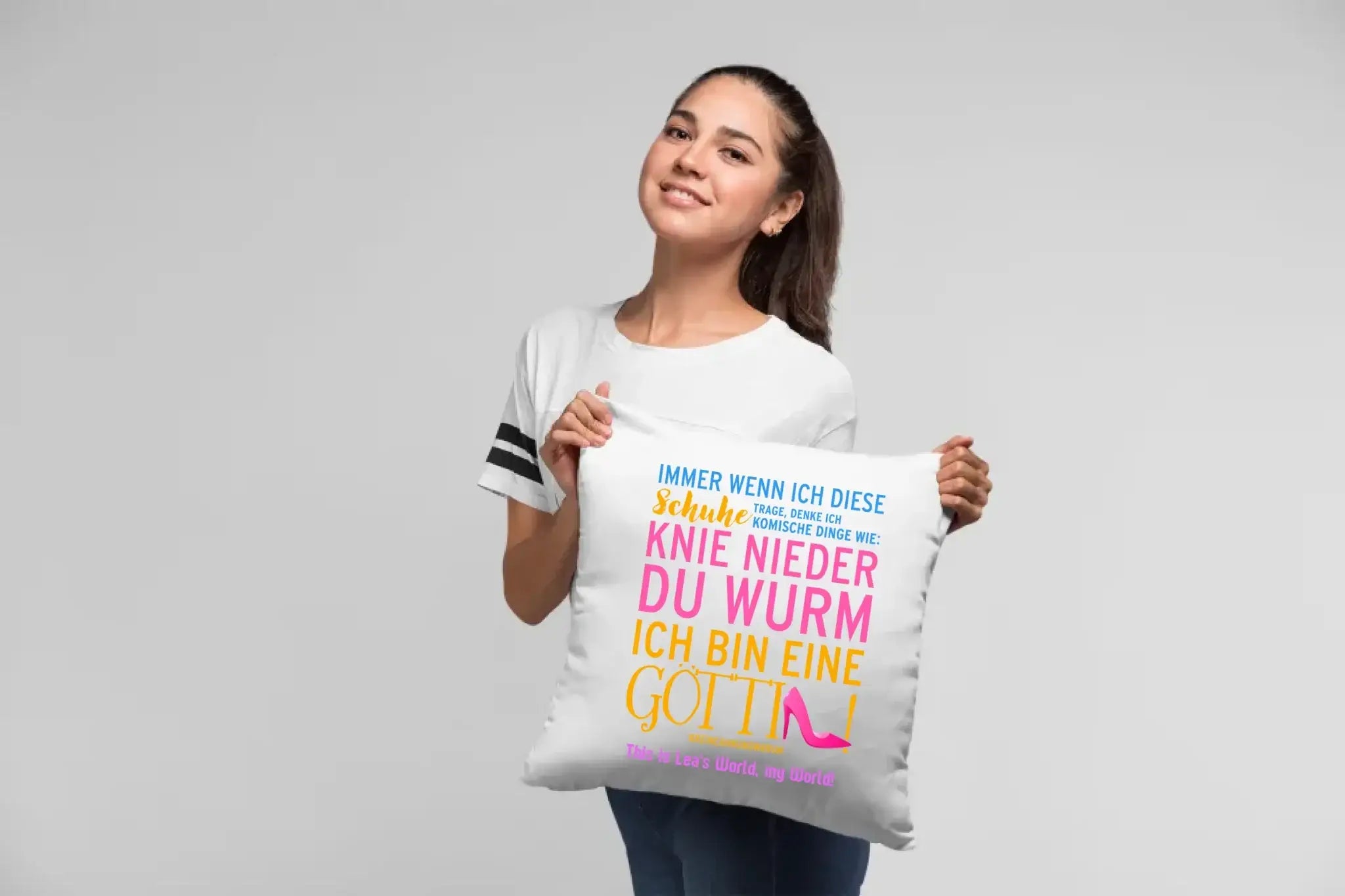pillow-mockup-of-a-woman-at-a-studio-23674