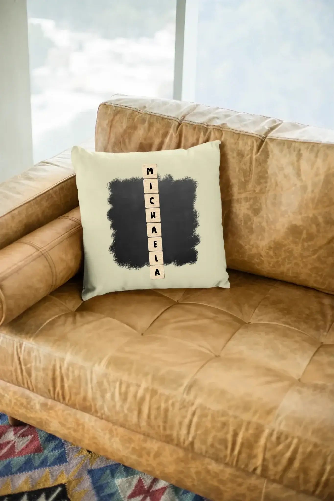 mockup-of-a-square-pillow-sitting-on-a-leather-couch-23551