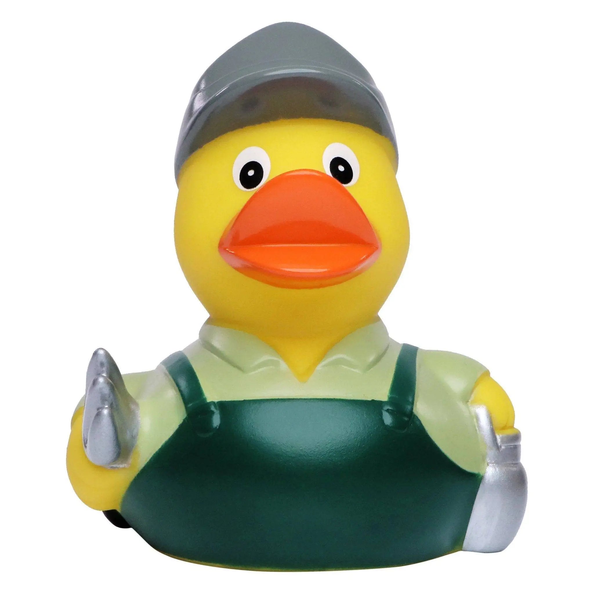 Gelbe quietscheente mit grauem bauhelm und grünen overalls von bauer als landwirt badeente