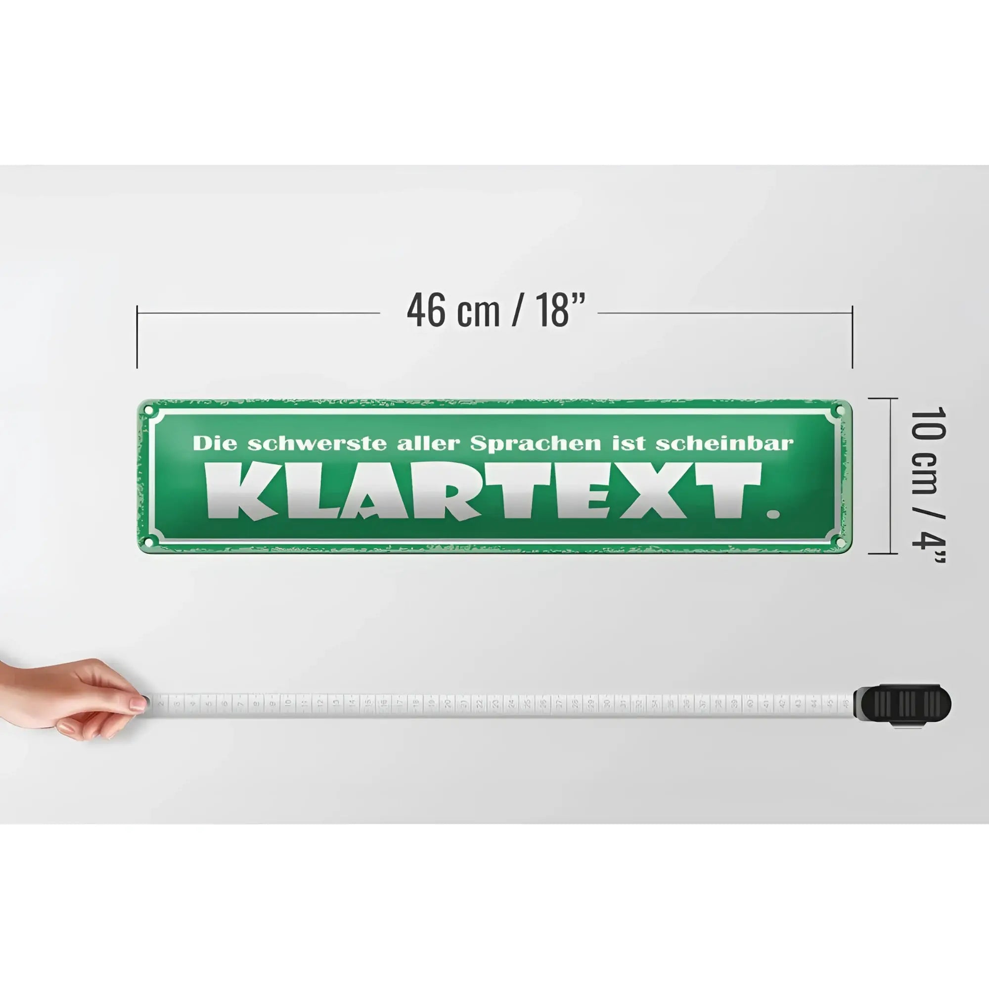 Grünes blechschild mit weißer schrift die schwerste aller sprachen ist scheinbar klartext 46x10 cm deko schild