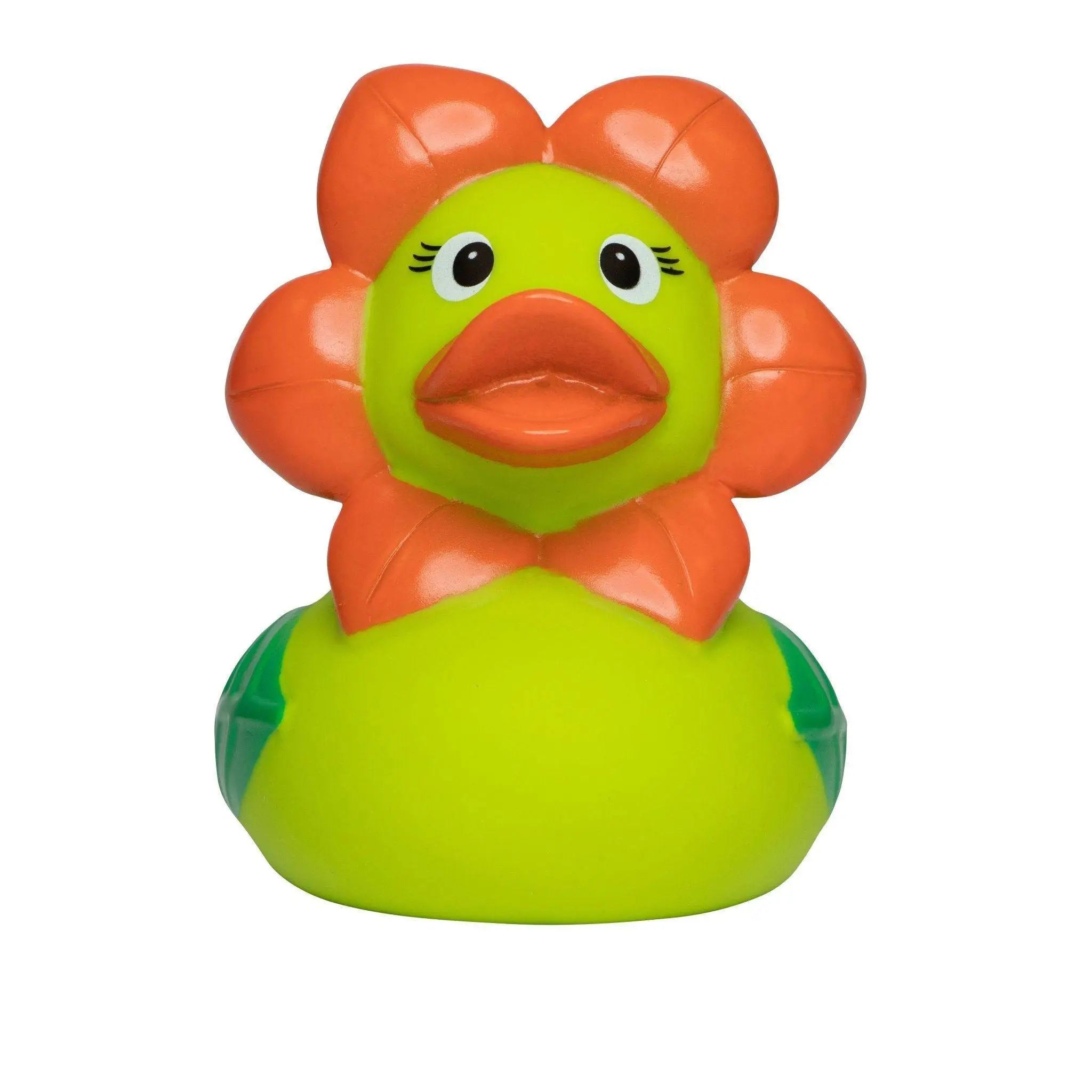 Eine grüne quietsche-ente aus gummi mit fröhlichem gesicht und orangefarbenem blumenkopf als badeente