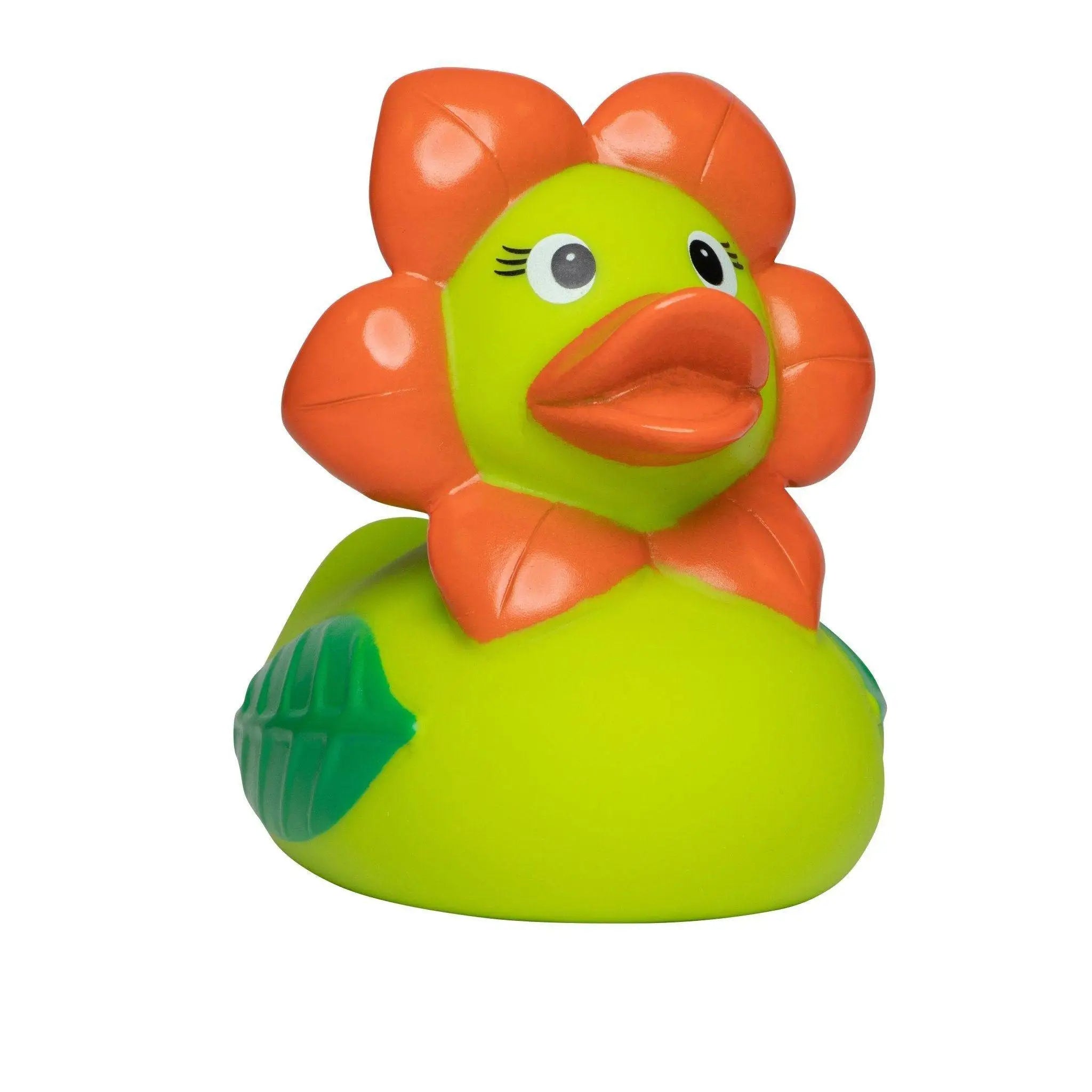 grüne badeente mit orangefarbener blume am kopf und kleinem grünen blatt seitlich aus gummi