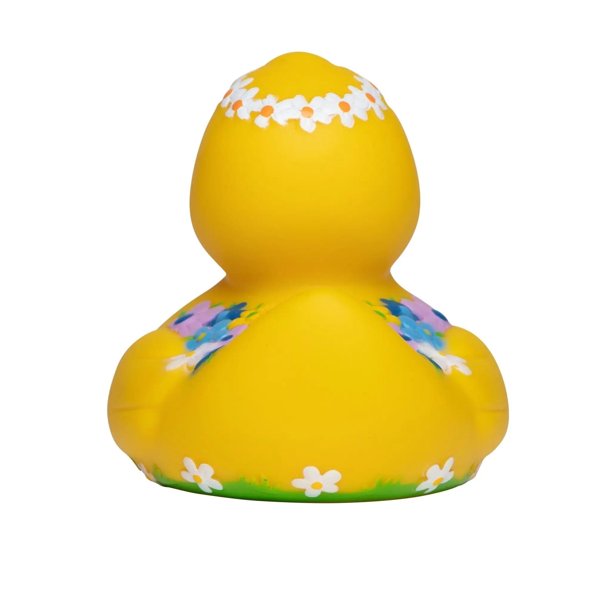 quietsche-ente badeente in leuchtendem gelb mit weißen kräutern und lila-blauen floralen mustern