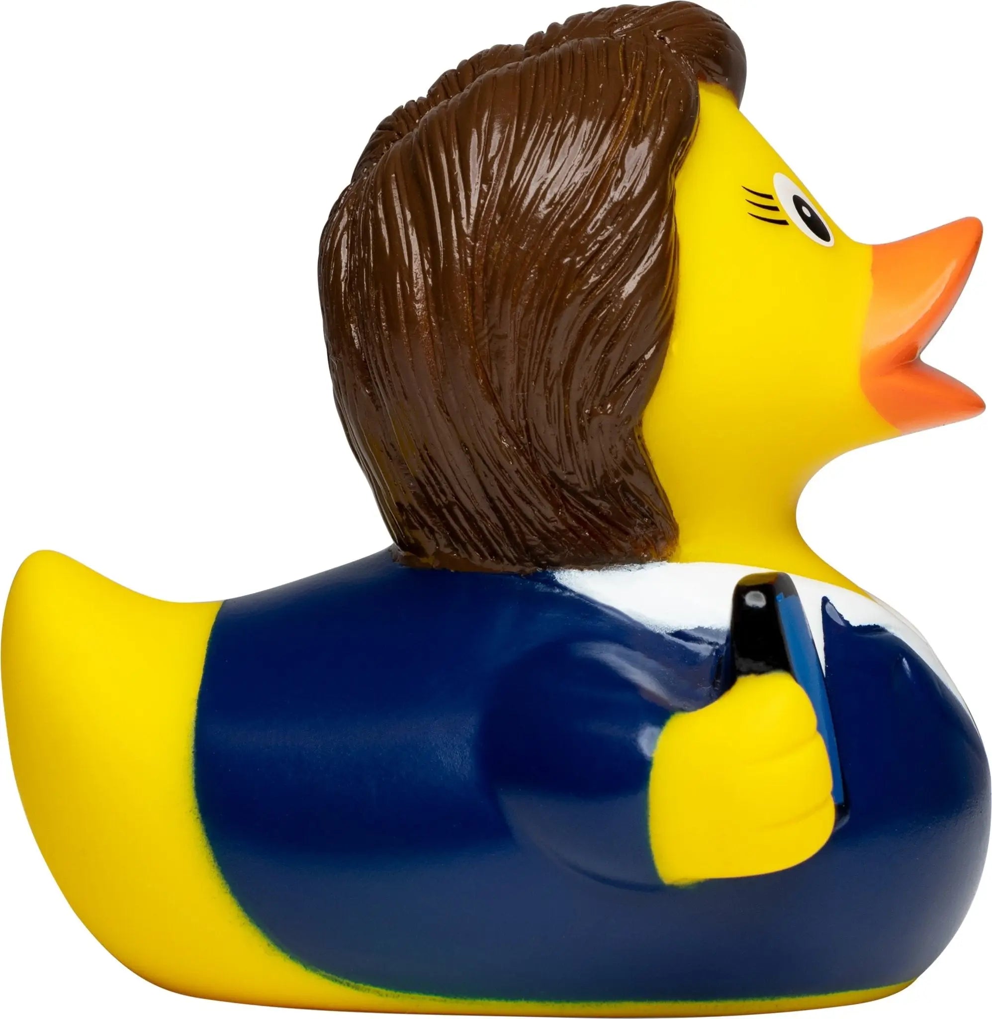 Eine gelbe quietscheente mit braunen haaren, blauem anzug und schwarzem smartphone als businesswoman Badeente