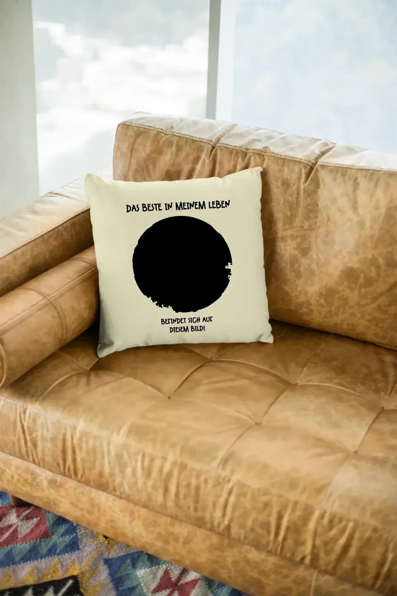 mockup-of-a-square-pillow-sitting-on-a-leather-couch-23551