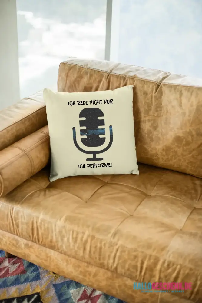 mockup-of-a-square-pillow-sitting-on-a-leather-couch-23551