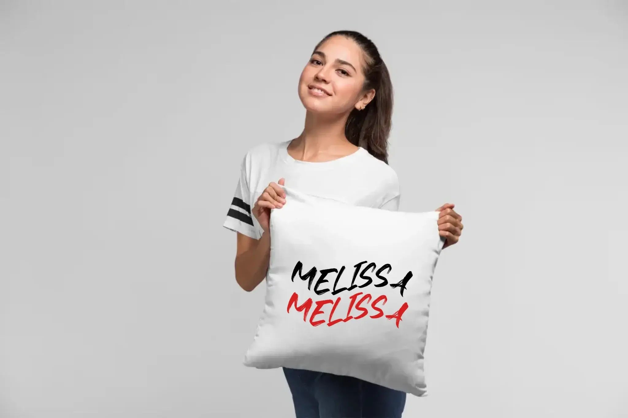 pillow-mockup-of-a-woman-at-a-studio-23674