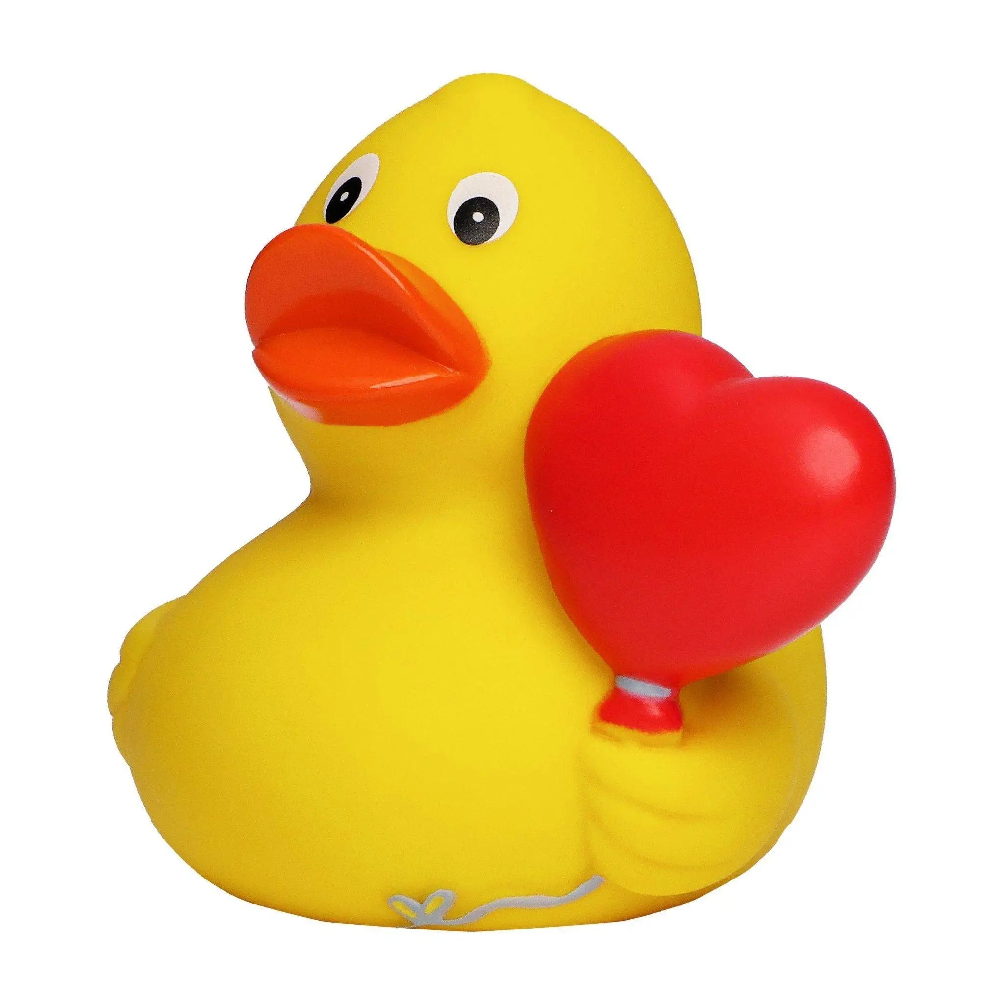 Gelbe quietscheente aus gummi mit rotem herz ballon perfekt für valentinstag hochzeit und jahrestag