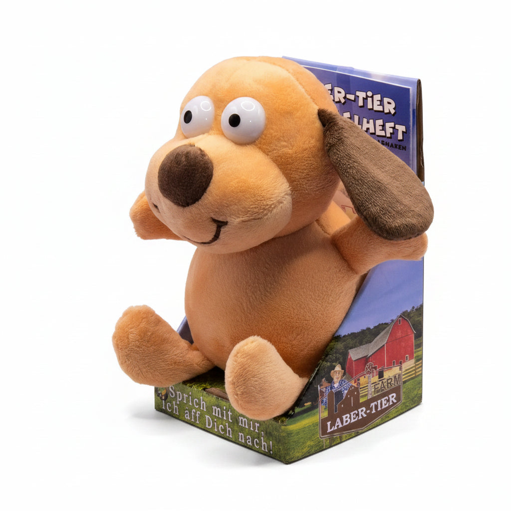 Ein plüschiger, tan-farbener sprechender hund laber-hund bruno mit braunen ohren und batterien im karton