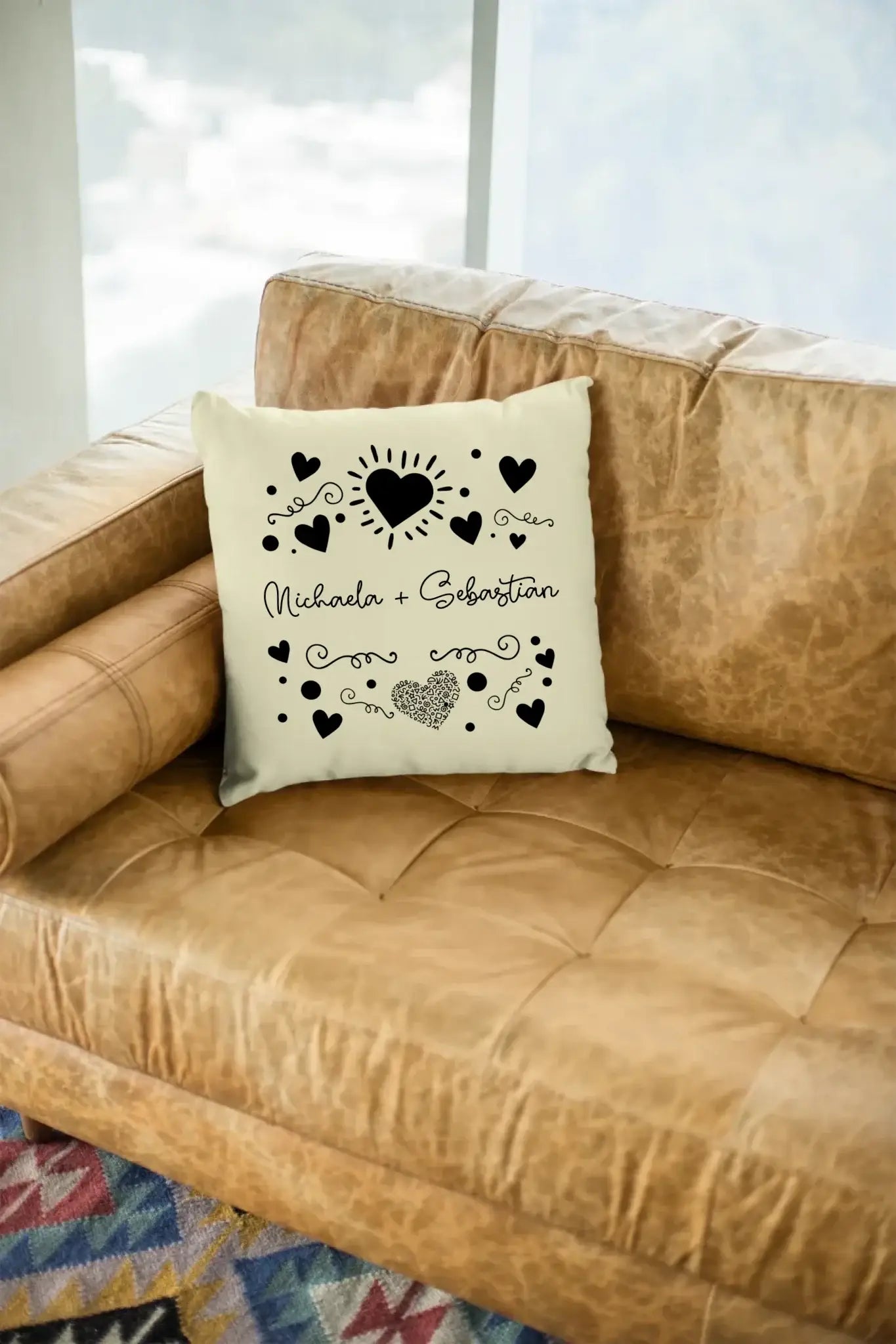 mockup-of-a-square-pillow-sitting-on-a-leather-couch-23551