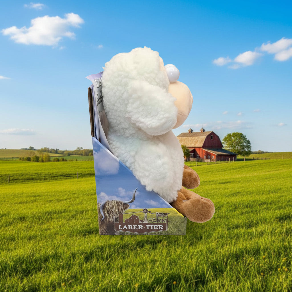 Weißes flauschiges laber-schaf bubbis plush toy mit braunen beinen und beiger schnauze in displaybox