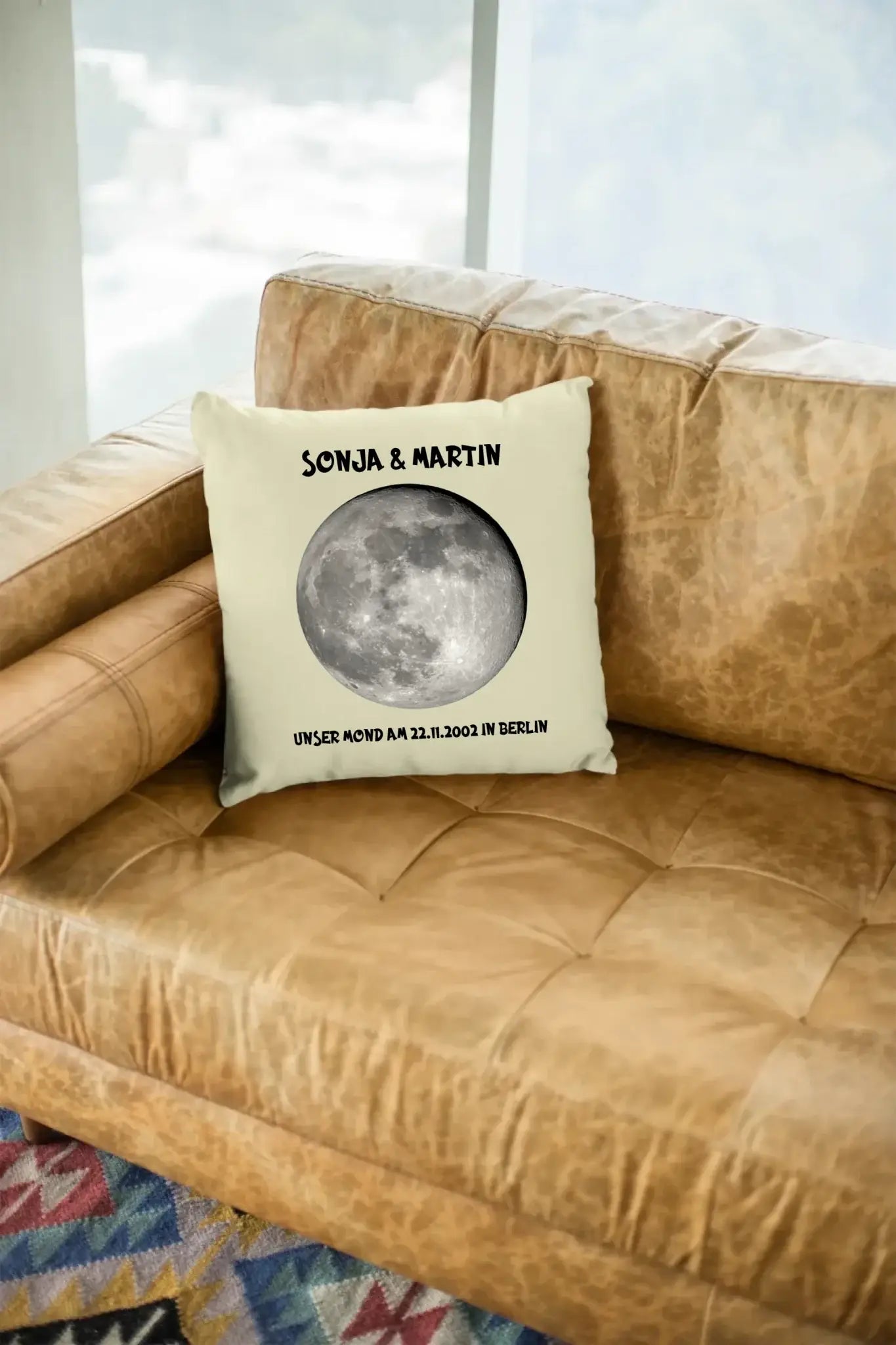 mockup-of-a-square-pillow-sitting-on-a-leather-couch-23551