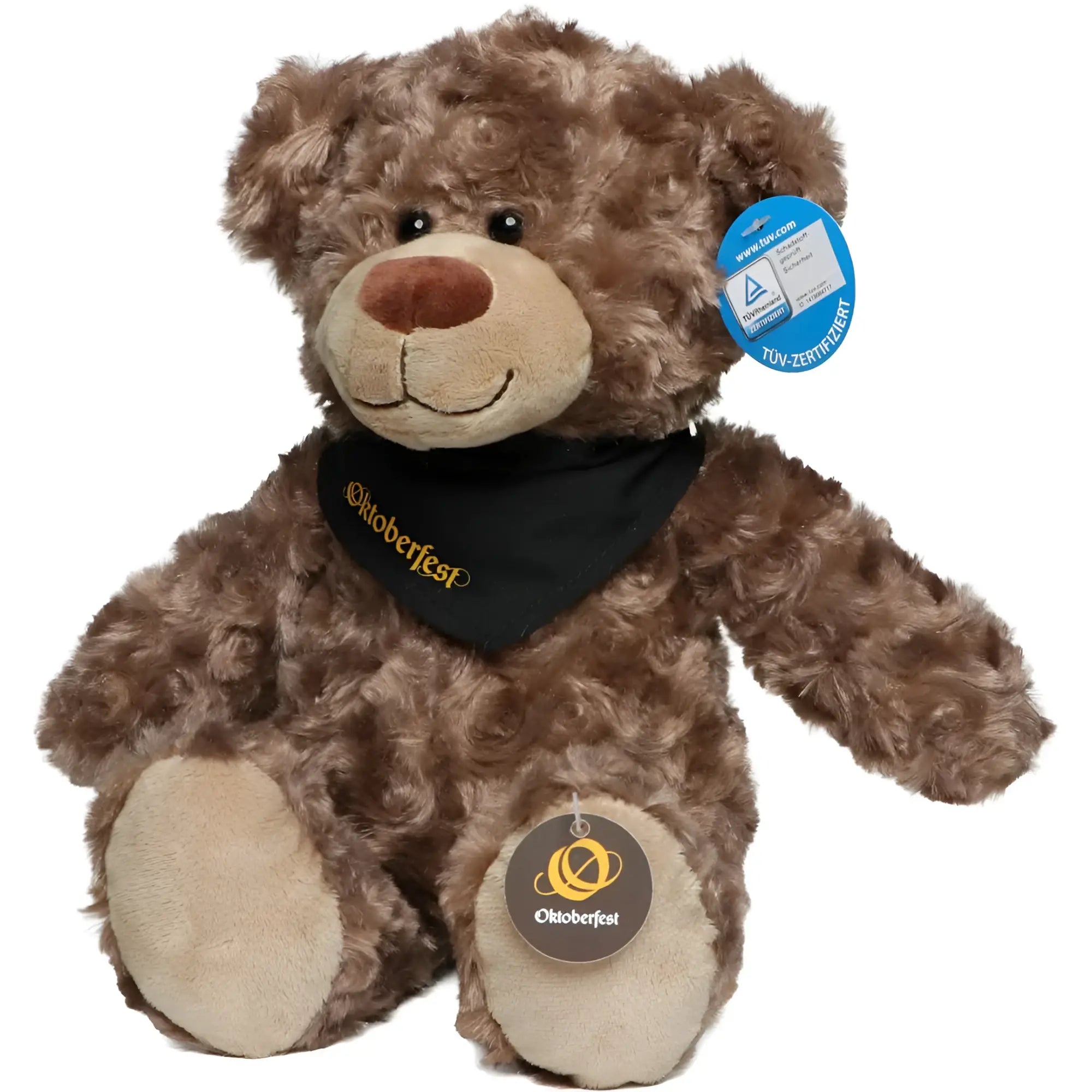 Ein brauner plüschiger oktoberfest bär bodo mit schwarzem bandana und goldener schrift sitzt aufrecht mit beigen pfotenflächen