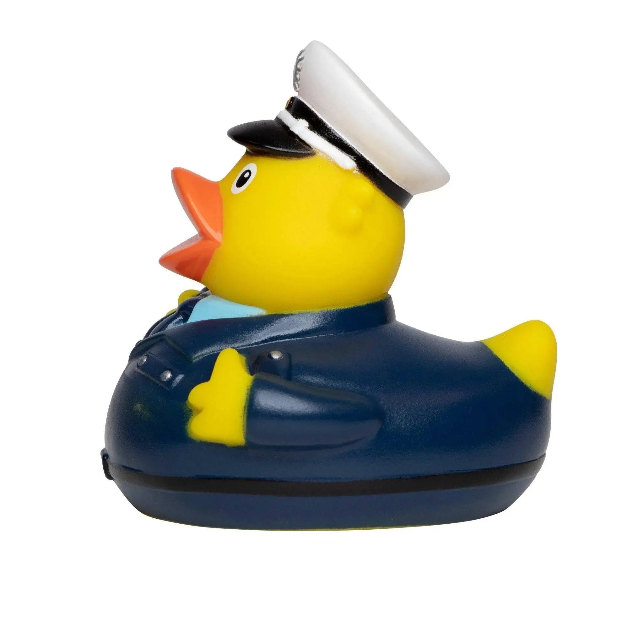 Gelbe badeente in polizist uniform mit dunkelblauer jacke und weißer mütze mit schwarzem rand