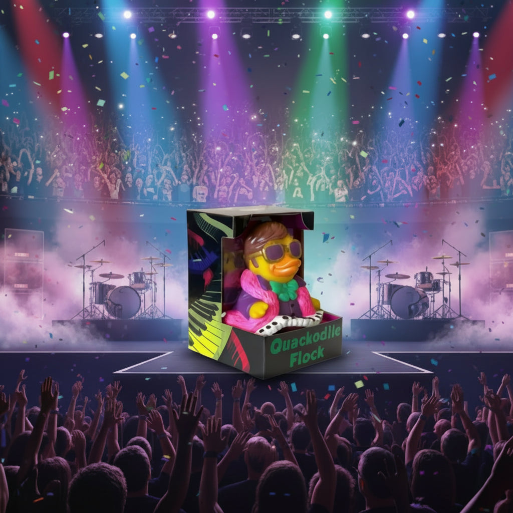 rosa und lila plush Quietscheente gekleidet as jazz musician mit gold sunglasses auf piano in celebriDucks packaging