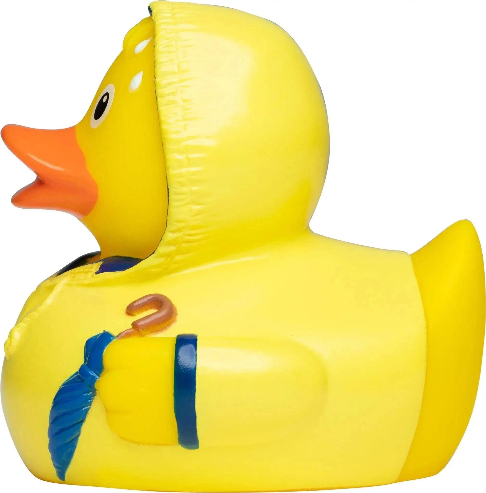 Gelbe badeente mit lila regenmantel und schirm aus der produktreihe schlechtwetter quietsche-ente