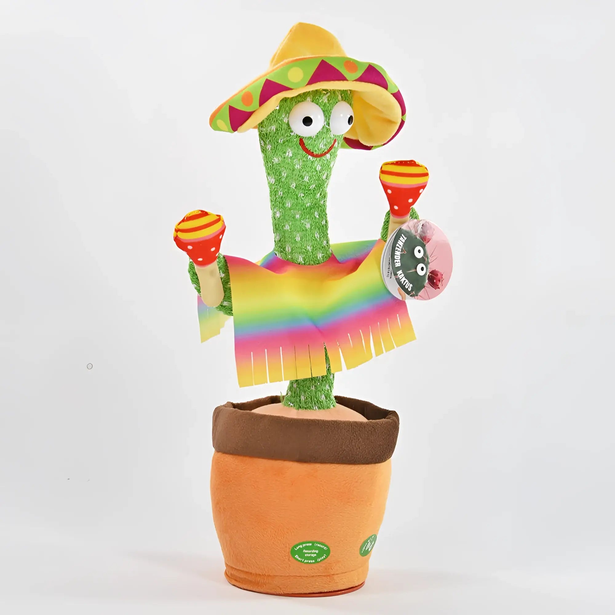 Grüner tanzender kaktus mit sound funktion, sombrero, rasseln und buntem rock sitzt im orangen topf