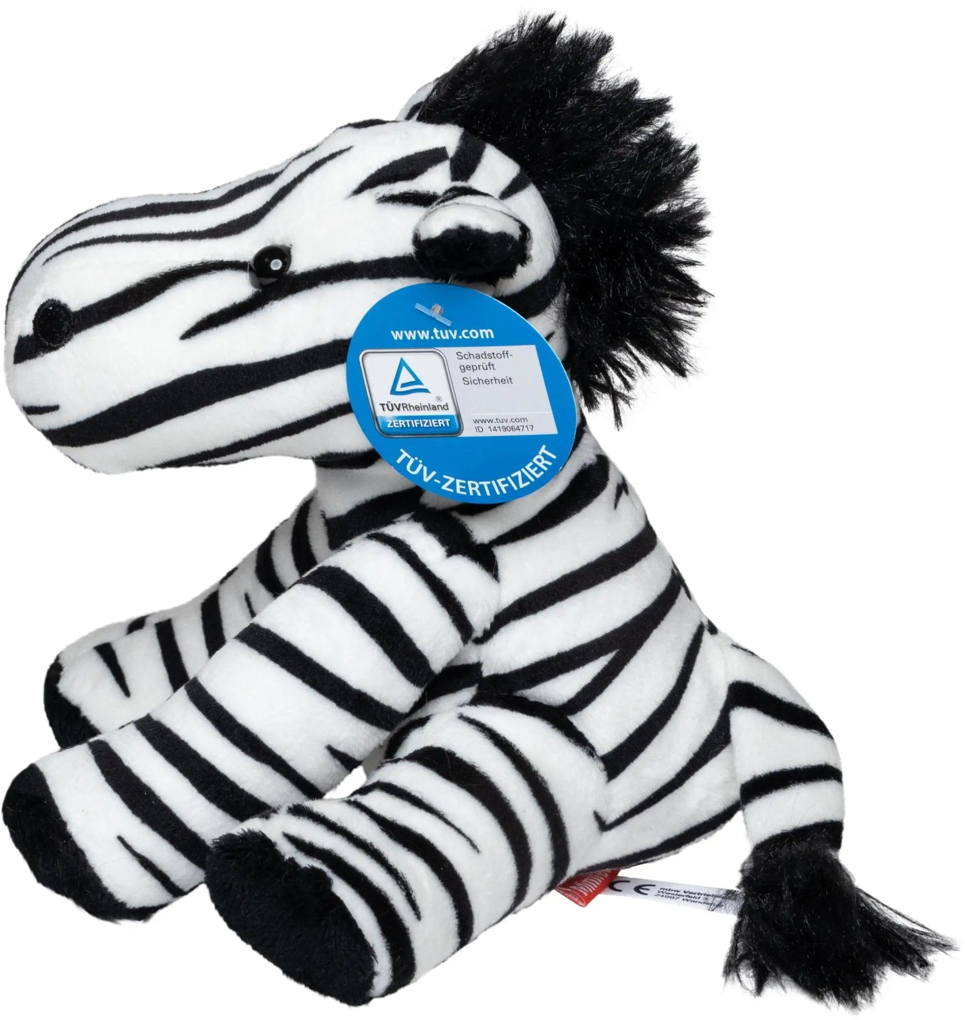 plüschtier zebra zora mit schwarz-weißen streifen aus weichem stoff und flauschiger textur