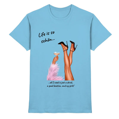 Light blue cotton t-shirt with party legs graphic holding martini glass and text life is so schön from ladies statement collection