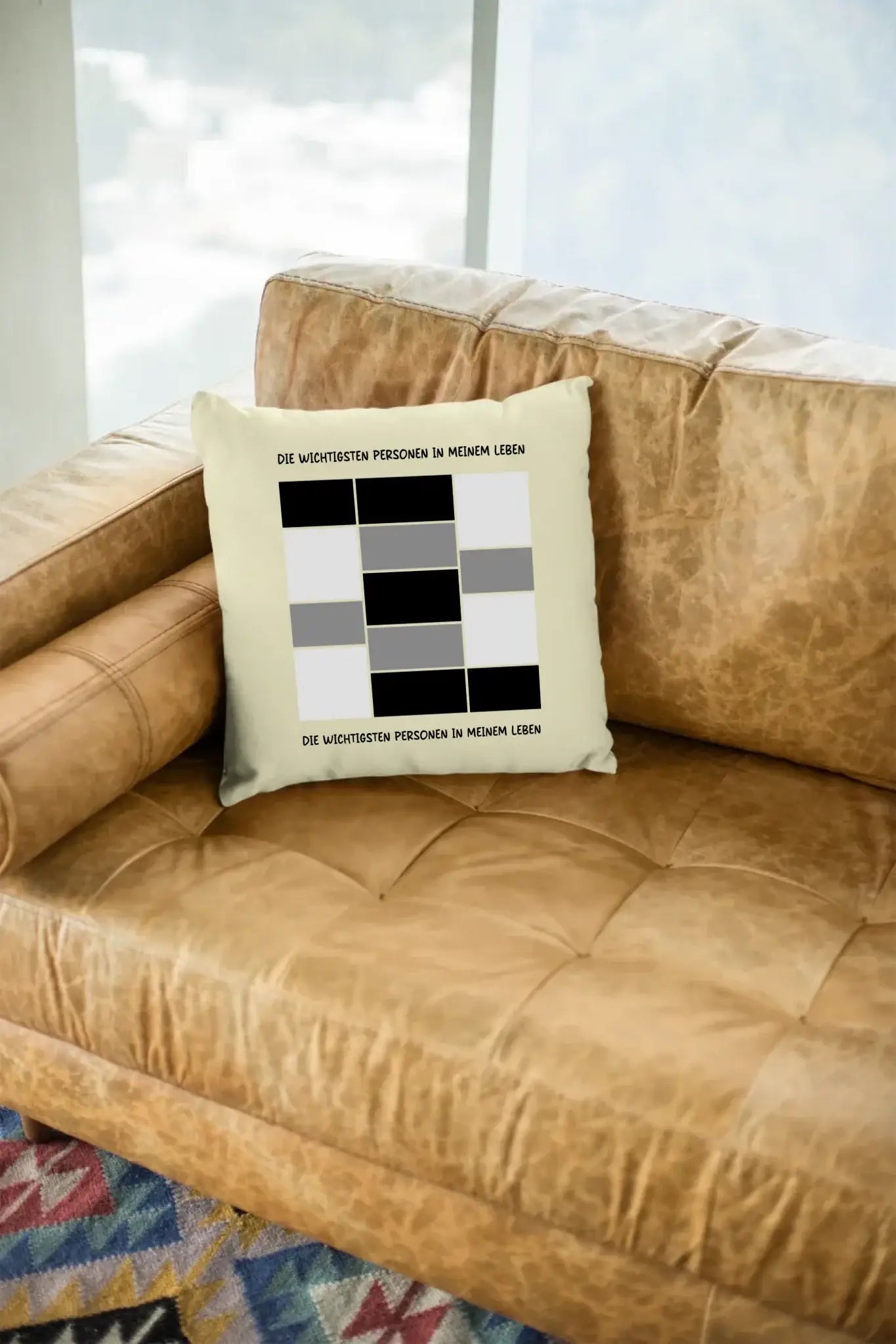 mockup-of-a-square-pillow-sitting-on-a-leather-couch-23551