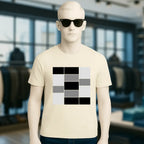 Creamfarbenes unisex premium t shirt aus bio baumwolle mit kühnem geometrischem muster aus schwarzen grauen und weißen quadraten