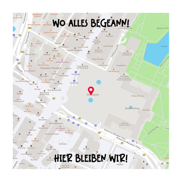Eine rote Kartenstecknadel markiert den Schloßplatz auf einer detaillierten Stadtkarte.