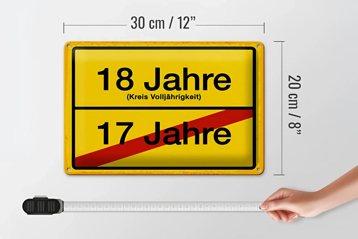 Gelbes rechteckiges blechschild 20x30cm mit schwarzem text 18 jahre kreis volljährigkeit und 17 jahre getrennt durch roten diagonalen streifen