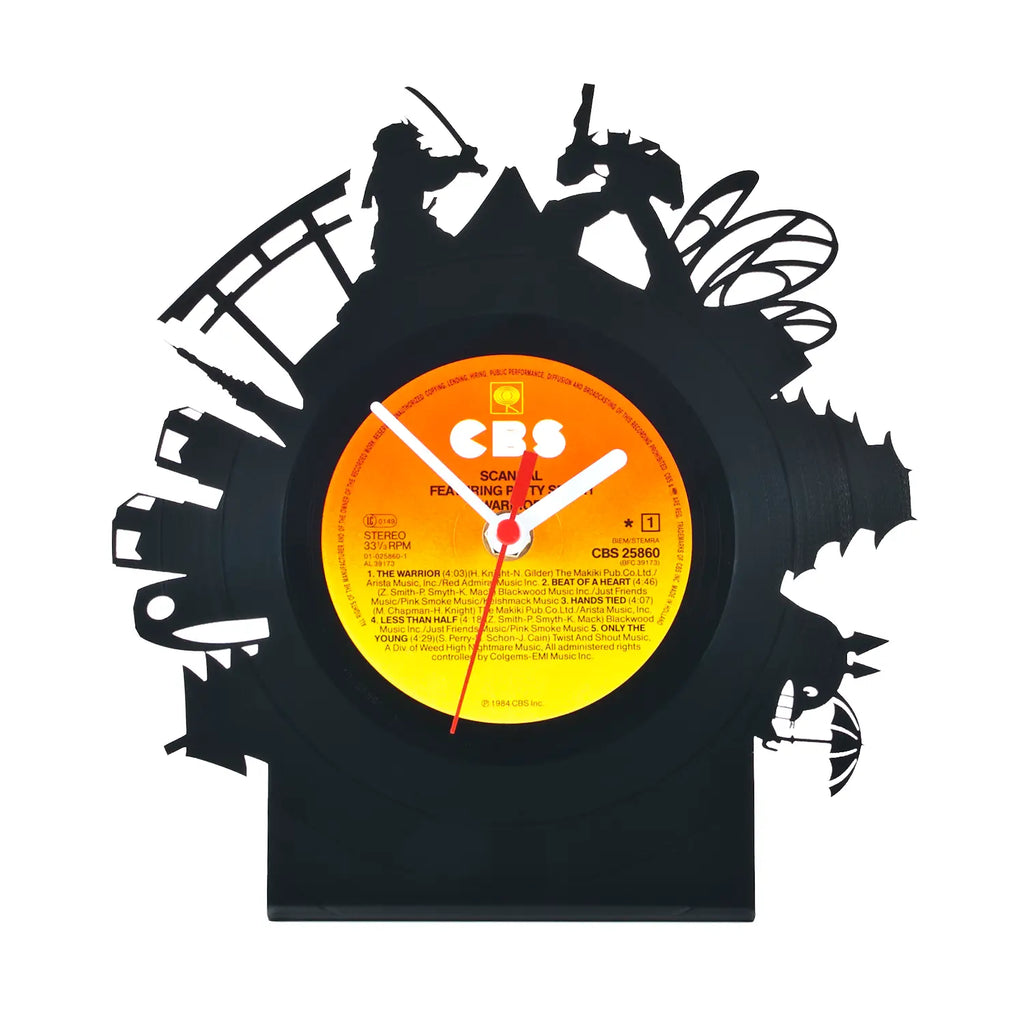 Schallplattentischuhr tokio aus schwarzem vinyl mit orange gelbem cbs label und fantasiecharakter ausschnitten