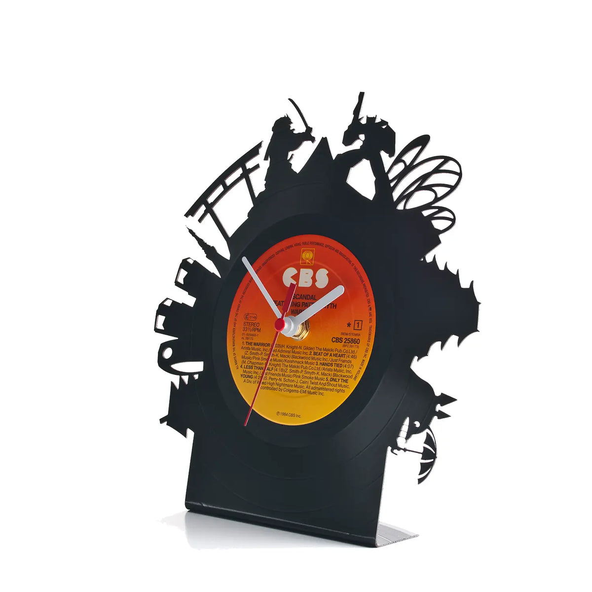Schallplattentischuhr tokio aus schwarzer vinyl mit orangem gelbem label und fantasy-silhouetten am rand