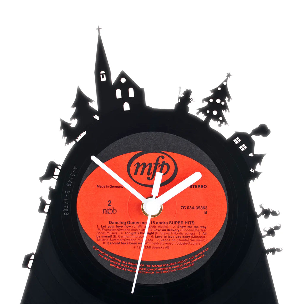 Eine schwarze vinyl schallplattentischuhr weihnachten 1 mit orangem mfb label und schwarzen weihnachtlichen silhouette cutouts