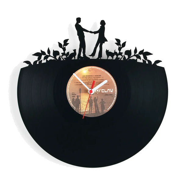 Schallplattenuhr verliebte schwarze vinyl wanduhr mit vintage orange label und weißen silhouetten von menschen und tieren
