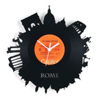 Schallplattenuhr rom schwarze vinyl wanduhr mit orange label weißem text und rom skyline silhouette
