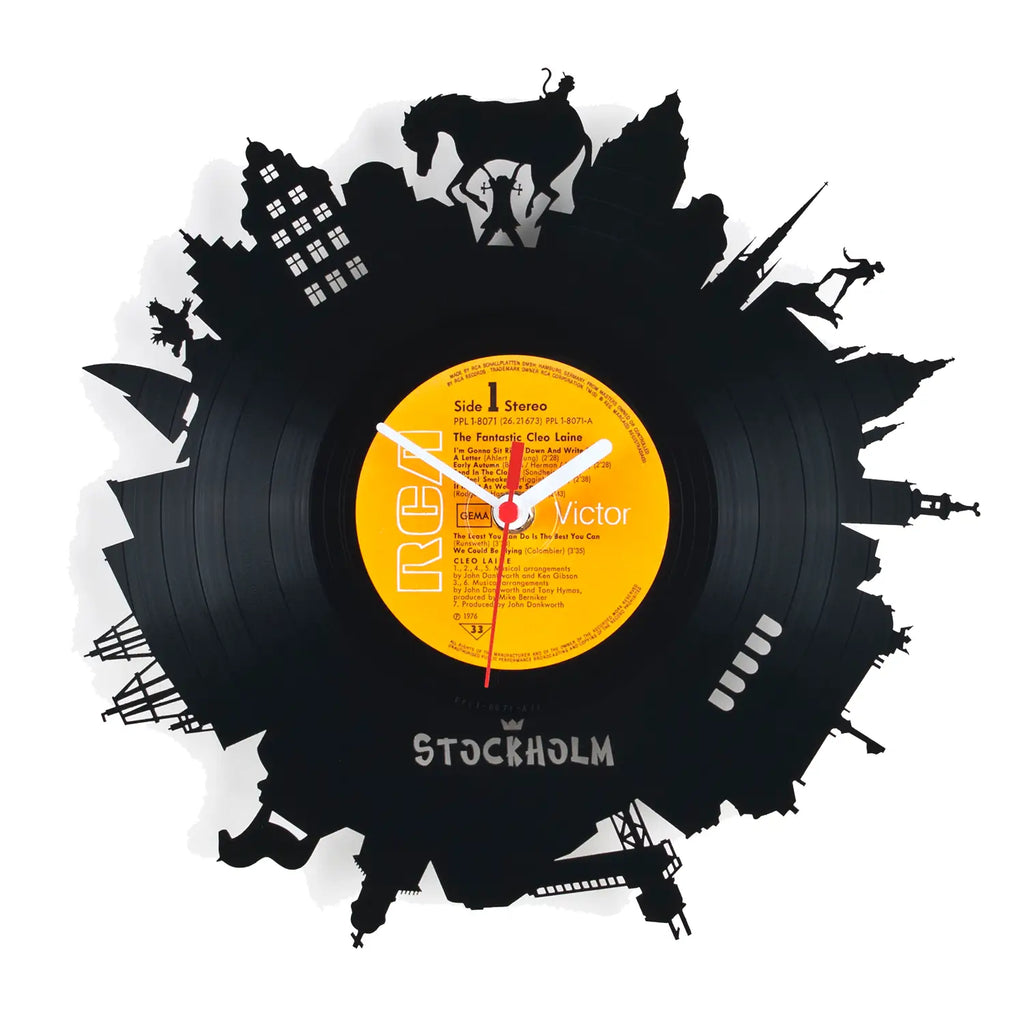 Schallplattenuhr stockholm schwarze vinyl wanduhr mit gelbem rca victor label und stockholm skyline silhouetten