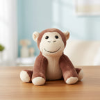 Ein plüschtier affe bjarne in braun und creme mit weichem stoff und gestickten gesichtszügen