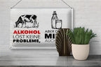 Weißes blechschild 20x30cm mit schwarzer kuhzeichnung und rotem schriftzug alkohol löst keine probleme