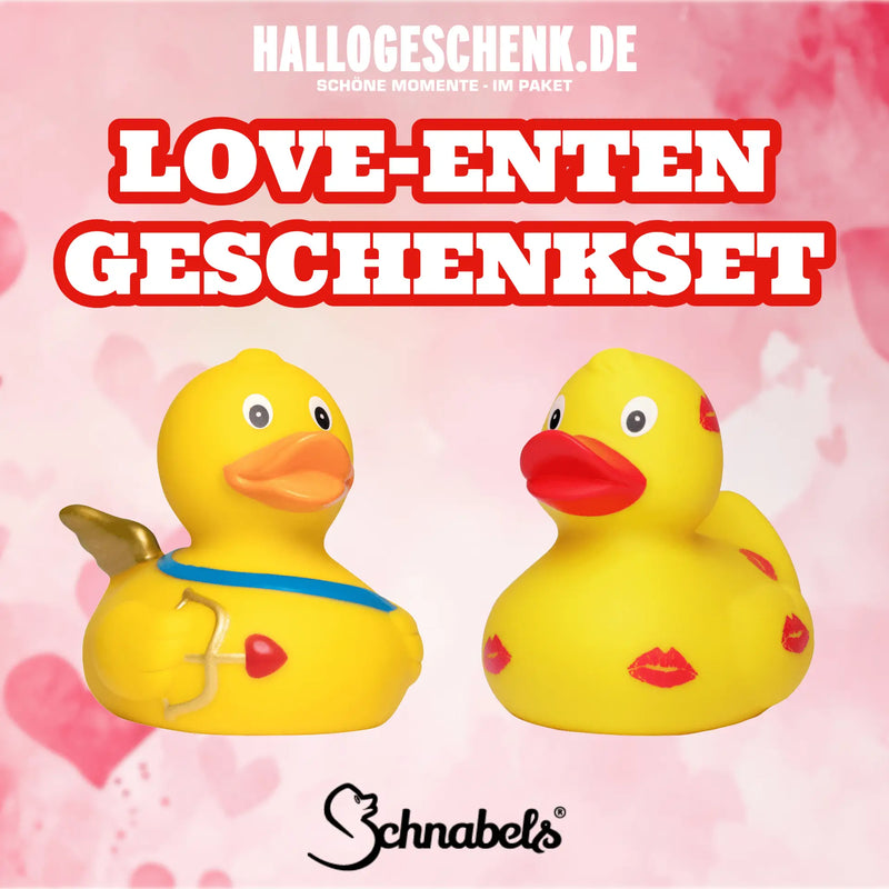 Gelbe badeente mit rotem mund, blauem halsband und goldenen flügeln aus pvc im amor love liebe valentinstag set