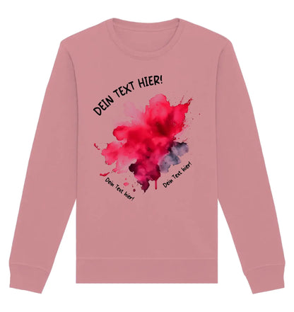 Ein weiches rosa sweatshirt mit langärmeln und bunten roten und violetten aquarellflecken aus der statement-collection