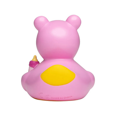 Pink quietsche-ente mit gelber fläche auf dem rücken hält babyflasche für baby rosa mädchen babyshower