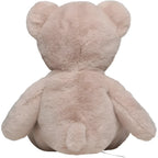 A soft blush-pink plush teddy bear with fluffy texture and rounded ears in taupe stofftier style