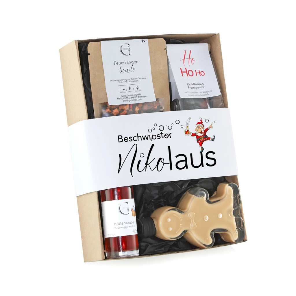 Weihnachtliches präsentkorb beschwipster nikolaus mit lebkuchenmann bonbon, rotem hüttenzaub likör und festlichen snacks