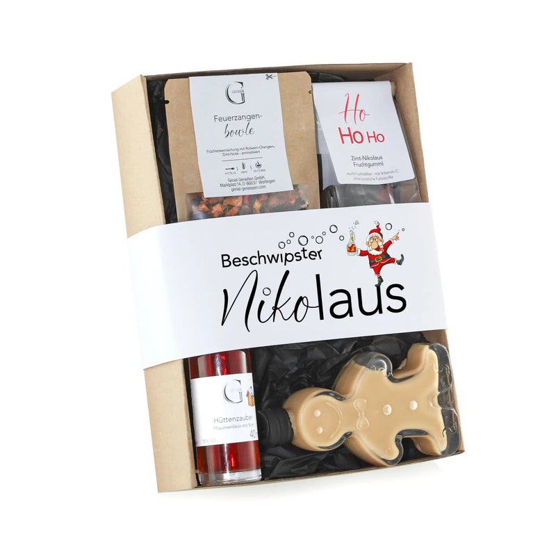 Weihnachtliches präsentkorb beschwipster nikolaus mit lebkuchenmann bonbon, rotem hüttenzaub likör und festlichen snacks