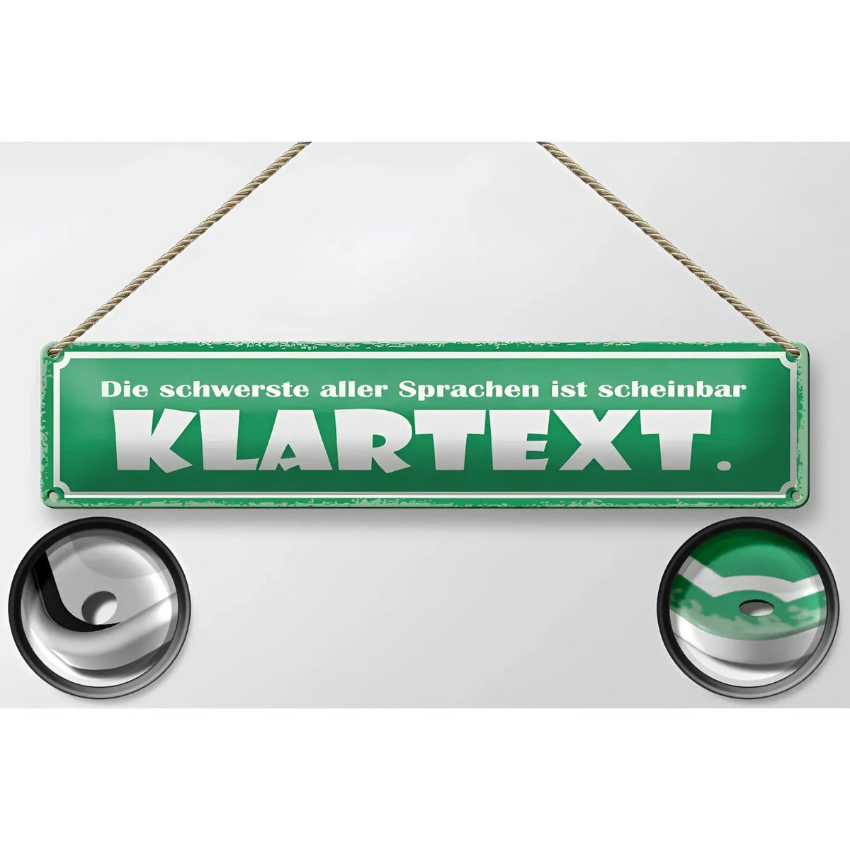 Grünes rechteckiges blechschild 46x10 cm mit weißem text die schwerste aller sprachen ist scheinbar klartext