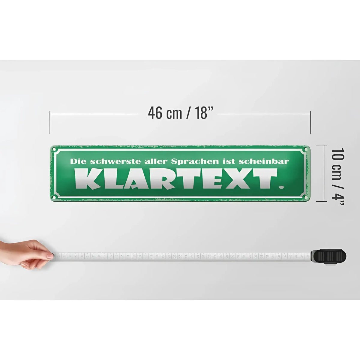 Grünes blechschild mit weißer schrift die schwerste aller sprachen ist scheinbar klartext 46x10 cm deko schild