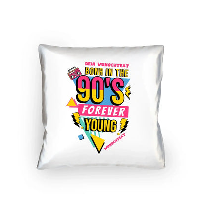 Weiße dekorative kissen mit lebendigem 90er jahre grafikdesign in rosa, gelb und türkis aus der born in 90s statement-collection