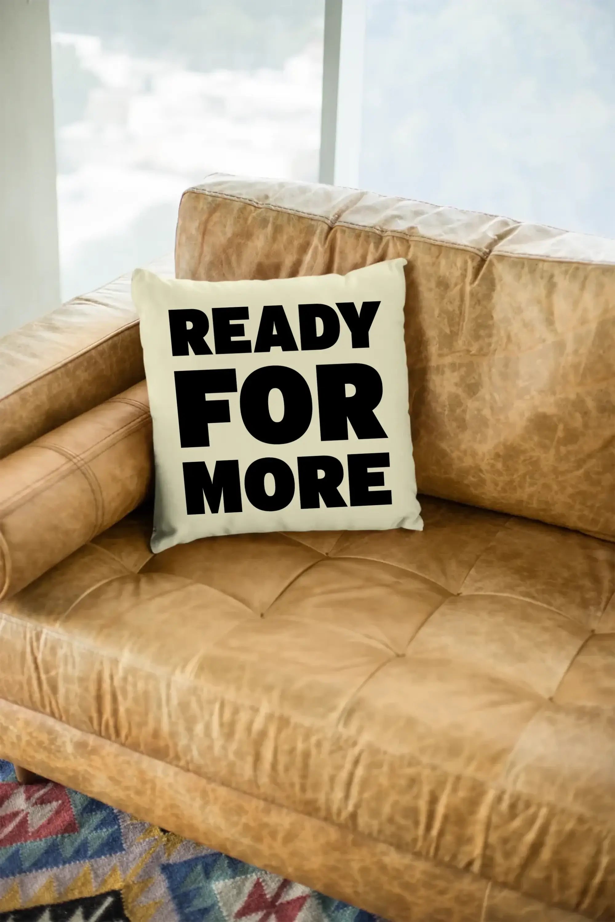 mockup-of-a-square-pillow-sitting-on-a-leather-couch-23551