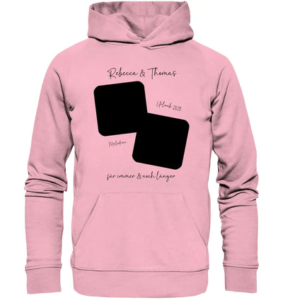 Ein weiches rosa hoodies mit schwarzem geometrischem design und personalisiertem text in eleganter schrift