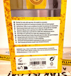 Gelbe kartonverpackung der duschgel mit zitronenduft bier ca 300 ml pet-beutel rückseite mit mehrsprachigen sicherheitswarnungen