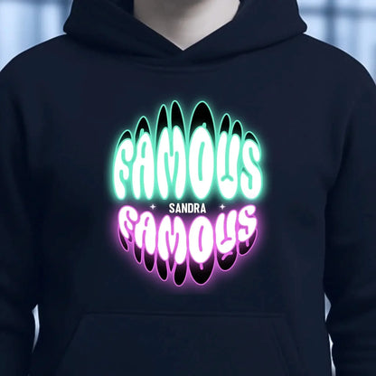 FAMOUS + Name • personalisierter Text • Unisex Premium Hoodie XS-5XL aus Bio-Baumwolle für Damen & Herren • Exklusivdesign • personalisiert
